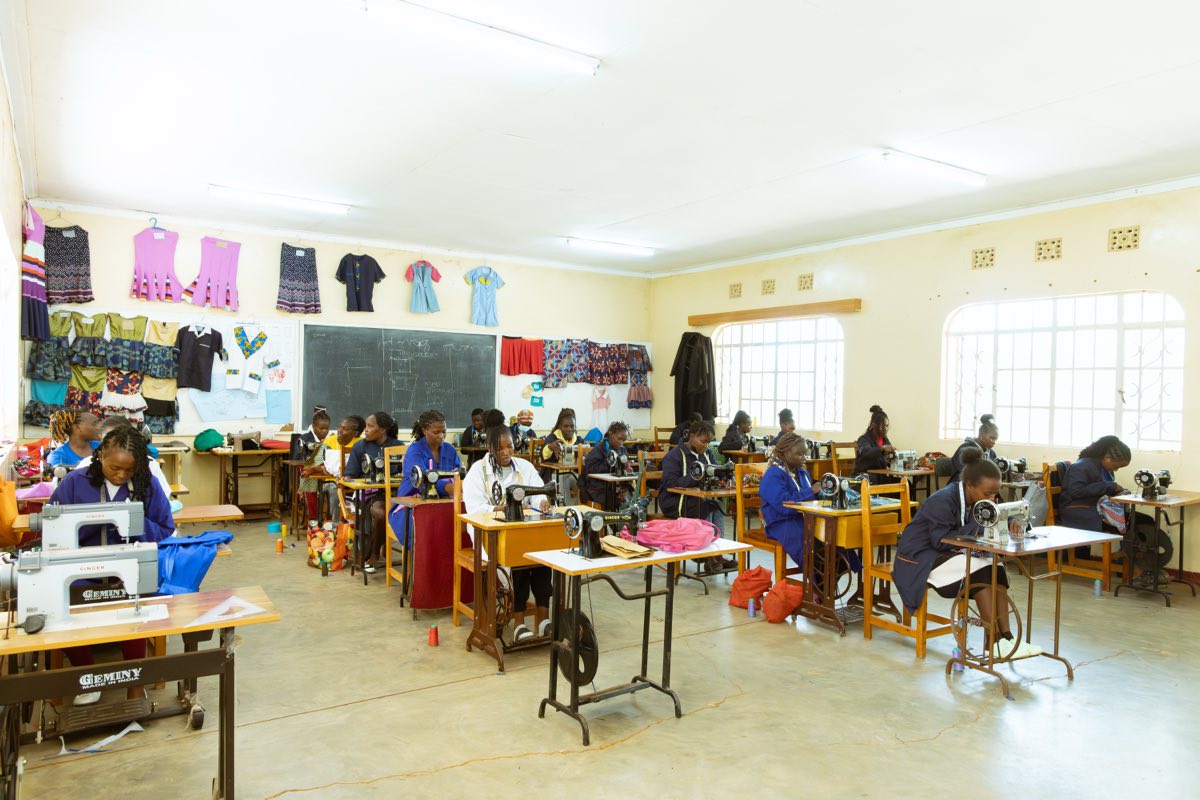 A fashion and design class at work on garment construction